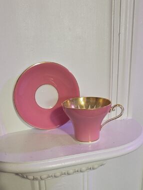 vintage Aynsley "corset" shaped teacup and saucer set featuring a vibrant pink